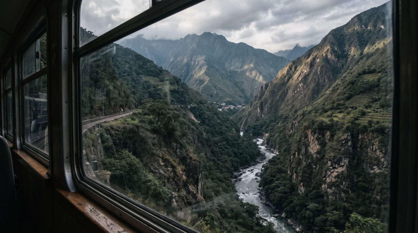 Clouds parting over the terraces at the Machu Picchu citadel gate, Peru