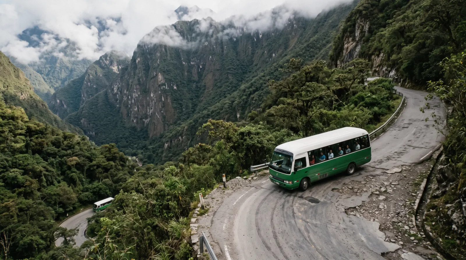 Tourist buses climbing the switchback Hiram Bingham road between Aguas Calientes and Machu Picchu, Peru
