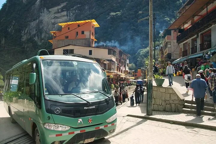 Air-conditioned tourist bus parked at the Machu Picchu bus terminal, Aguas Calientes, Peru