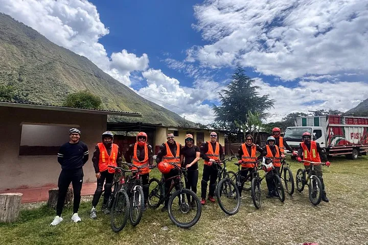 Mountain bikers descending from Abra Malaga on the Inca Jungle Trek to Machu Picchu, Peru