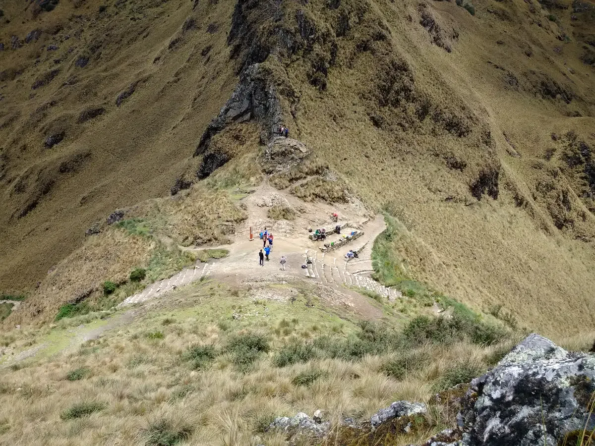 The stone Inca Trail path climbing through the Peruvian Andes on the way to Machu Picchu, Peru