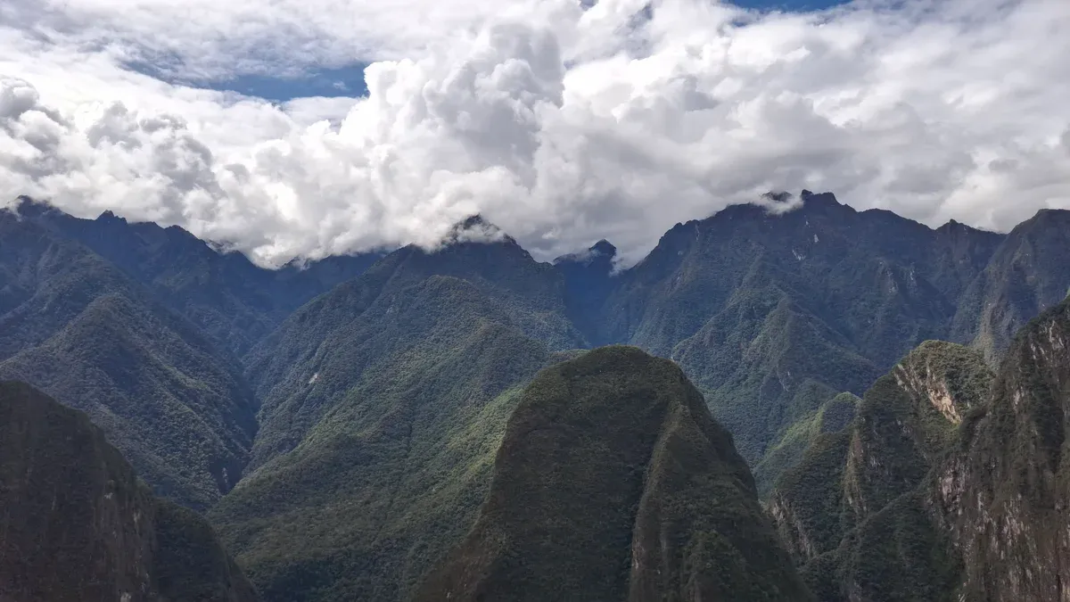 Putucusi Mountain, the round forested peak facing Machu Picchu, Peru